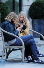 ELSA HOSK and Tom Daly on a bench in New York 04/09/2017