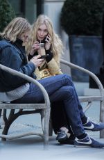 ELSA HOSK and Tom Daly on a bench in New York 04/09/2017