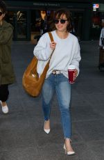 EMILIA CLARKE in Jeans at Heathrow Airport in London 04/20/2017