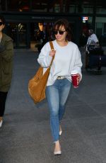 EMILIA CLARKE in Jeans at Heathrow Airport in London 04/20/2017