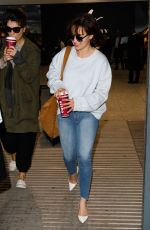 EMILIA CLARKE in Jeans at Heathrow Airport in London 04/20/2017