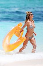 HEIDI KLUM in Bikini at a Beach in Turks and Caicos 04/05/2017