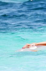 HEIDI KLUM in Bikini at a Beach in Turks and Caicos 04/05/2017