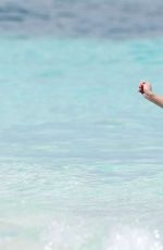 HEIDI KLUM in Bikini on the Beach in Turks & Caicos 04/02/2017