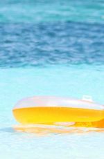 HEIDI KLUM in Bkini on the Beach at Caicos Islands 04/06/2017