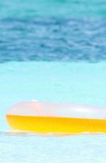 HEIDI KLUM in Bkini on the Beach at Caicos Islands 04/06/2017