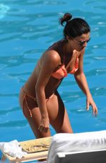 LUCY MECKLENBURGH in Bikini at a Pool at Beverly Hilton Hotel in Beverly Hills 04/20/2017