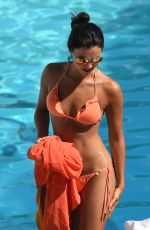 LUCY MECKLENBURGH in Bikini at a Pool at Beverly Hilton Hotel in Beverly Hills 04/20/2017