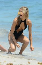 JOY CORRIGAN in Swimsuit at a Beach in Miami 04/27/2017