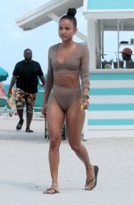 KARREUCHE TRAN in Tankini on the Beach in Miami 04/15/2017