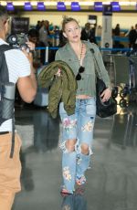 KATE HUDSON in Ripped Jeans at JFK Airport in New York 04/29/2017