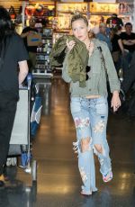 KATE HUDSON in Ripped Jeans at JFK Airport in New York 04/29/2017