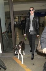 KATE UPTON with Her Dog at LAX Airport in Los Angeles 04/10/2017