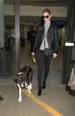 KATE UPTON with Her Dog at LAX Airport in Los Angeles 04/10/2017