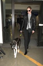 KATE UPTON with Her Dog at LAX Airport in Los Angeles 04/10/2017