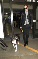 KATE UPTON with Her Dog at LAX Airport in Los Angeles 04/10/2017