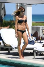 KELLY BENSIMON in Bikini at a Pool at Boca Beach Club in Boca Raton 03/31/2017
