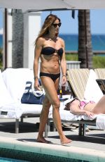 KELLY BENSIMON in Bikini at a Pool at Boca Beach Club in Boca Raton 03/31/2017