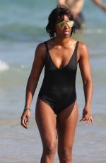 KELLY ROWLAND in Swimsuit at a Beach in Sydney 03/29/2017