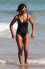 KELLY ROWLAND in Swimsuit at a Beach in Sydney 03/29/2017