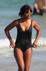 KELLY ROWLAND in Swimsuit at a Beach in Sydney 03/29/2017