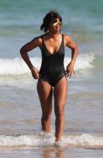 KELLY ROWLAND in Swimsuit at a Beach in Sydney 03/29/2017