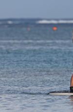KENDRA WILKINSON Paddle Boarding on Vacation in Hawaii, April 2017