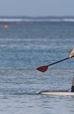 KENDRA WILKINSON Paddle Boarding on Vacation in Hawaii, April 2017