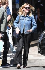 KIRSTEN DUNST Shows Off Her Diamond Engagement Ring at Family Brunch in Studio City 04/14/2017