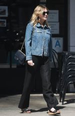 KIRSTEN DUNST Shows Off Her Diamond Engagement Ring at Family Brunch in Studio City 04/14/2017