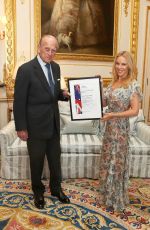 KYLIE MINOGUE at Windsor Castle Receiving Britain-Australia Society Award 04/04/2017
