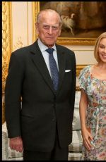 KYLIE MINOGUE at Windsor Castle Receiving Britain-Australia Society Award 04/04/2017
