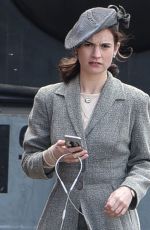LILY JAMES on the Set of Guernsey in Bristol 04/26/2017