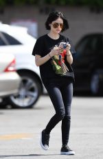 LUCY HALE Drinks a Starbucks Iced Coffee Out in West Hollywood 04/28/2017