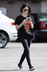 LUCY HALE Drinks a Starbucks Iced Coffee Out in West Hollywood 04/28/2017