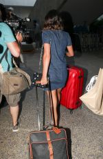 LUCY MECKLENBURGH in Denim Dress at LAX Airport in Los Angeles 04/10/2017