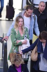 MARGOT ROBBIE and Tom Ackerley at  JFK Airport in New York 04/23/2017