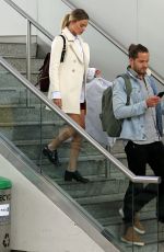 MARGOT ROBBIE and Tom Ackerley at  JFK Airport in New York 04/26/2017
