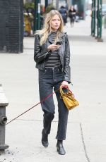 MARTHA HUNT Walks Her Dog Out in New York 04/07/2017