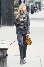 MARTHA HUNT Walks Her Dog Out in New York 04/07/2017