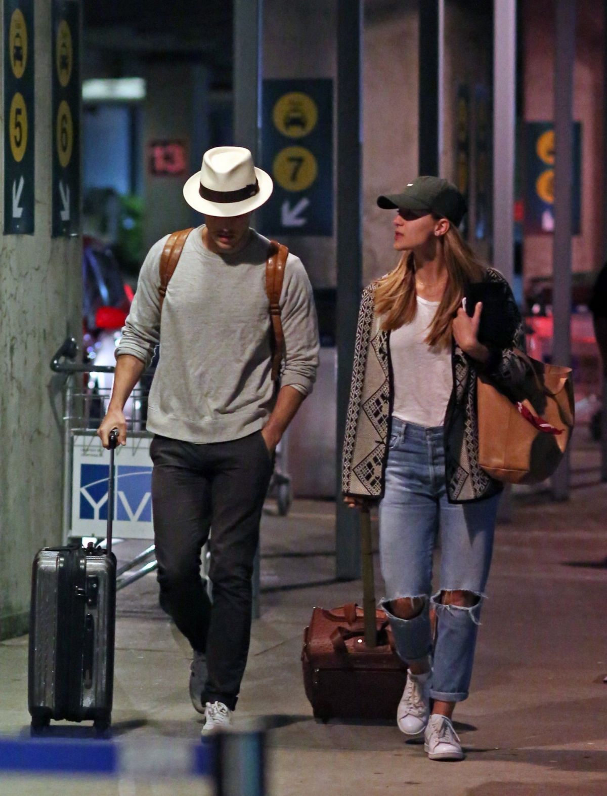 MELISSA BENOIST and Chris Wood Arriving in Vancouver 03/29 ...