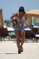 METISHA SCHAEFER in Bikini on the Beach in Miami 04/10/2017