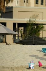 MICHELLE HUNZIKER in Bikini at a Beach in Dubai 04/12/2017