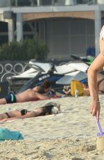 MICHELLE HUNZIKER in Bikini at a Beach in Dubai 04/12/2017