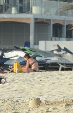 MICHELLE HUNZIKER in Bikini at a Beach in Dubai 04/12/2017