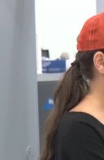 MILA KUNIS at Los Angeles International Airport 04/14/2017