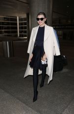 MIRANDA KERR at LAX Airport in Los Angeles 04/04/2017