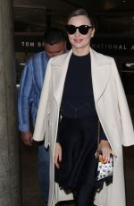 MIRANDA KERR at LAX Airport in Los Angeles 04/04/2017