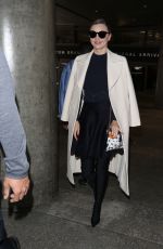 MIRANDA KERR at LAX Airport in Los Angeles 04/04/2017