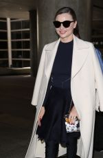 MIRANDA KERR at LAX Airport in Los Angeles 04/04/2017